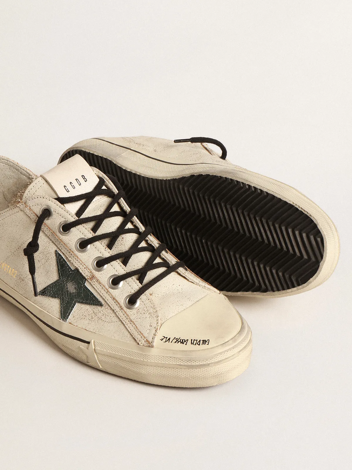 V-Star in glossy leather with metallic green crackle leather star